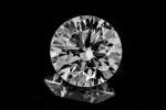 DIAMANT taillé en brillant sur papier de 0.65 ct de...