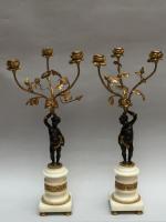 Paire de CANDELABRES à trois lumières en bronzes doré et...