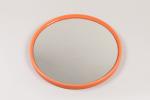 Gilac
Miroir rond en plastique orange. Marqué au dos. D. 51...