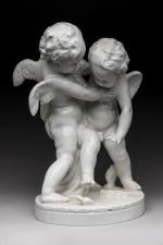 GROUPE en porcelaine représentant deux anges "Le coeur brisé". Marques...