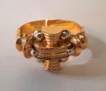 Important BRACELET Manchette rigide en or deux tons 750/°°, le...