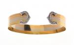 BRACELET jonc ouvert trois ors 750/°° (rose, gris, jaune), les...