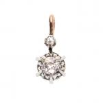 PENDENTIF en ors gris et rose 750/°° serti d'un diamant...