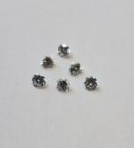 Six petits DIAMANTS pesant environ 0,10 ct chacun