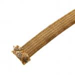 BRACELET "Ceinture" en or jaune 750/°° sertissure en or gris...