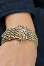 BRACELET "Ceinture" en or jaune 750/°° sertissure en or gris...