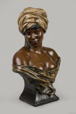 Goldscheider
« Buste d'africaine au turban »
Sujet en terre cuite polychrome....