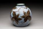 Tharaud     
Vase de forme boule en...