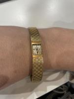 KODY - MONTRE BRACELET de dame en or jaune 750/°°,...