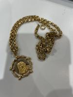 COLLIER ET MEDAILLE de la Vierge en or jaune 750/°°....