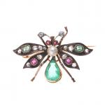 BROCHE "Mouche" en argent 800/°° et or 750/°°, les ailes...