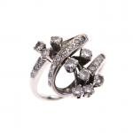 BAGUE "Gerbe de Fleur" sur un anneau en volute en...