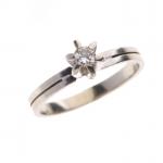 BAGUE "solitaire" en or gris 750/°° et diamant de 0.10...