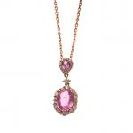 COLLIER en or rose 750/°°, le pendentif central serti de...