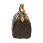 LOUIS VUITTON - SAC modèle "Speedy" 30 cm en toile...