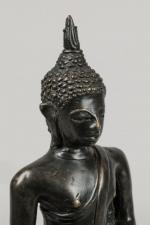 Statuette en bronze de patine brune, représentant Bouddha assis dans...