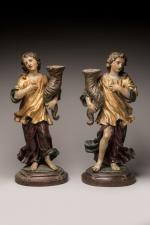 * Paire d'ANGES porte-torchères en bois polychrome et or tenant...