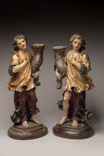 * Paire d'ANGES porte-torchères en bois polychrome et or tenant...