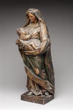 VIERGE à l'Enfant en bois sculpté polychrome. Époque XVIIIème siècle....