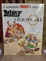 UDERZO. Astérix Légionnaire. Hachette, 2005. Avec dessin au stylo tête...