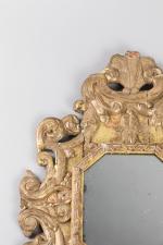 MIROIR octogonal en bois sculpté et doré, ajouré à décor...