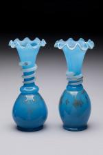 Deux VASES balustre à col pincé en opaline bleue à...