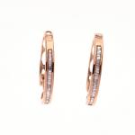 CREOLES en or rose 750/°° serties de diamants baguettes. D....