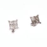 PAIRE DE BOUCLES D'OREILLES  en or gris 585/°° serties...