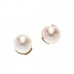 Paire de BOUTONS d'OREILLES en or gris 750/°° ornés chacun...