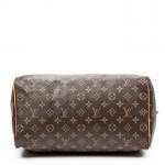 LOUIS VUITTON - SAC modèle "Speedy" 35 cm en toile...