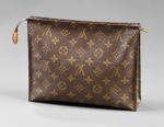 LOUIS VUITTON - POCHETTE en toile enduite monogram et cuir...