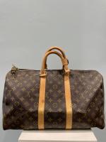 LOUIS VUITTON - SAC modèle "Keepall" 45 cm en toile...