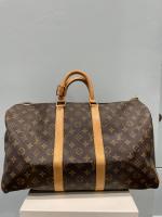 LOUIS VUITTON - SAC modèle "Keepall" 45 cm en toile...