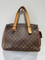 LOUIS VUITTON - SAC modèle "Multipli-Cité" GM en toile monogram...