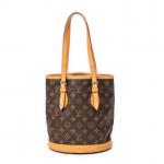 LOUIS VUITTON - SAC modèle "Seau" en toile monogram et...