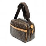 LOUIS VUITTON - SAC "Reporter" PM en toile monogram et...