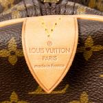 LOUIS VUITTON - SAC modèle "Keepall" 60 cm en toile...