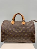 LOUIS VUITTON - SAC modèle "Speedy" 35 cm en toile...