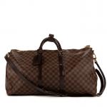 LOUIS VUITTON - SAC modèle "Keepall Bandoulière" 55 cm en...