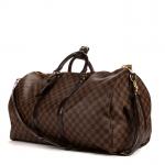 LOUIS VUITTON - SAC modèle "Keepall Bandoulière" 55 cm en...