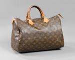 LOUIS VUITTON - SAC à main "Speedy" 35cm en toile...