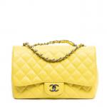 CHANEL - SAC modèle "Timeless" en cuir caviar couleur jaune...