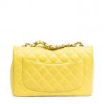 CHANEL - SAC modèle "Timeless" en cuir caviar couleur jaune...