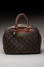 LOUIS VUITTON - SAC modèle "Trouville" en toile monogram et...