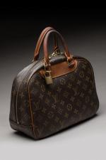 LOUIS VUITTON - SAC modèle "Trouville" en toile monogram et...