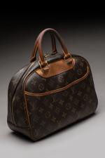 LOUIS VUITTON - SAC modèle "Trouville" en toile monogram et...