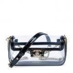 CHANEL - SAC en toile vinyl transparente et vernis noir,...