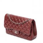 CHANEL - SAC modèle "Timeless" en cuir caviar couleur burgundy...