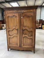 ARMOIRE mouluré en  bois fruitier à deux portes, ...