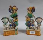 INDOCHINE OU CHINE . Deux statuettes en grès polychrome à...